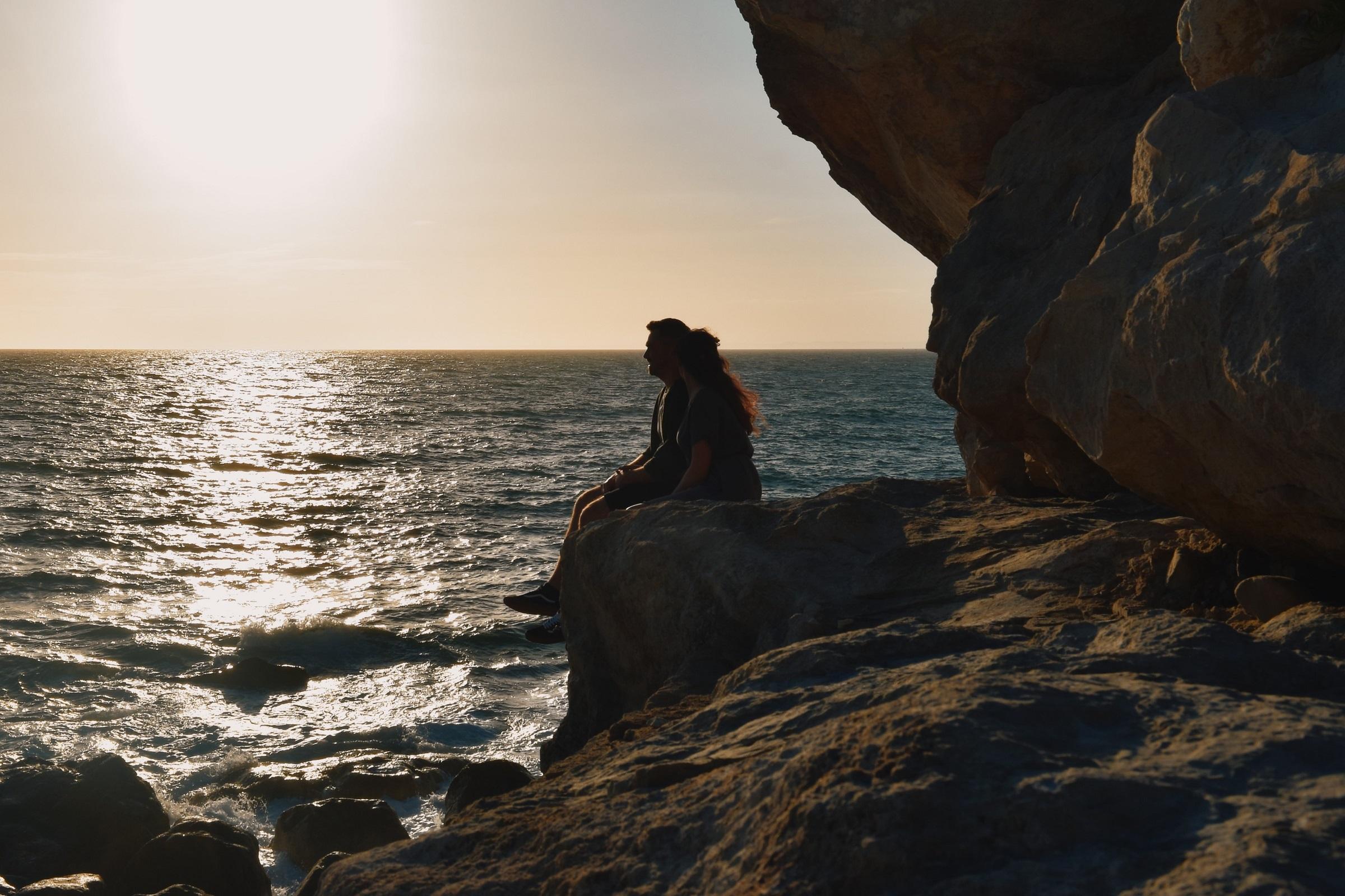 Zach and Kirsty sitting on the rocks